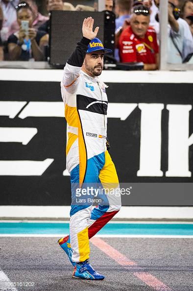 ABU DHABI, UNITED ARAB EMIRATES - NOVEMBER 25: Fernando Alonso of Spain and McLaren F1 waves to the crowd from the track at the end of the Abu Dhabi Formula One Grand Prix at Yas Marina Circuit on November 25, 2018 in Abu Dhabi, United Arab Emirates. (Photo by Lars Baron/Getty Images)